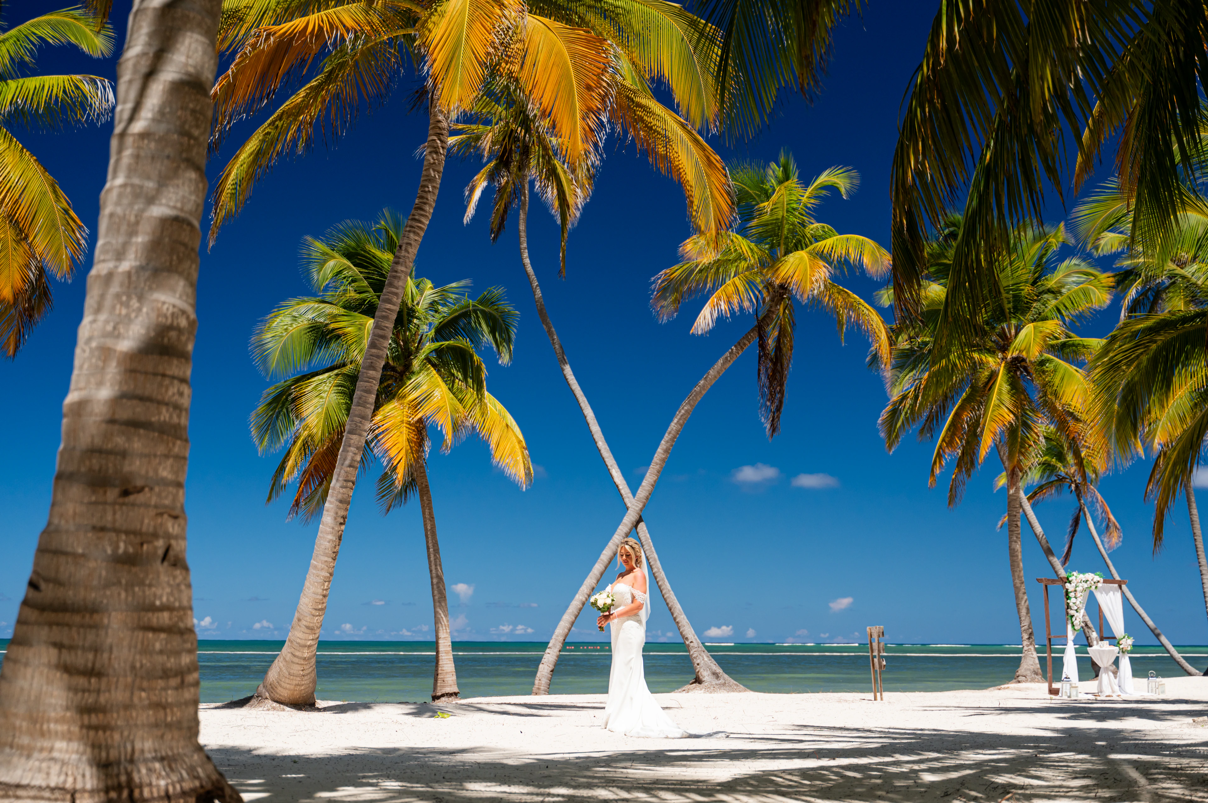 Couple on Punta Cana beach - book your destination wedding photographer